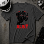 SURPRISED TO BE ALIVE T-SHIRT